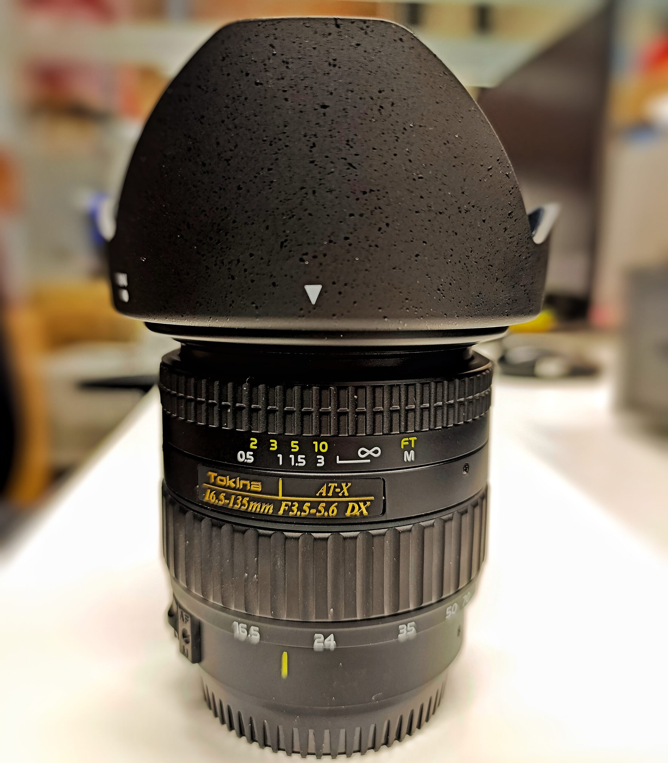 Tokina AT-X16.5-135 F3.5-5.6 (CAF)